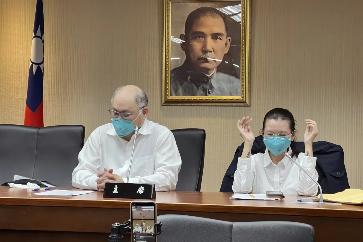 Taiwanese human rights activist Lee Ming-che (L) and his wife Lee Ching-yu attend a press conference in Taipei, Taiwan, on May 10, 2022. (Johnson Lai/AP Photo)