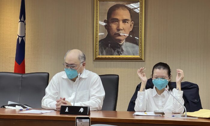 Taiwanese human rights activist Lee Ming-che (L) and his wife Lee Ching-yu attend a press conference in Taipei, Taiwan, on May 10, 2022. (Johnson Lai/AP Photo)