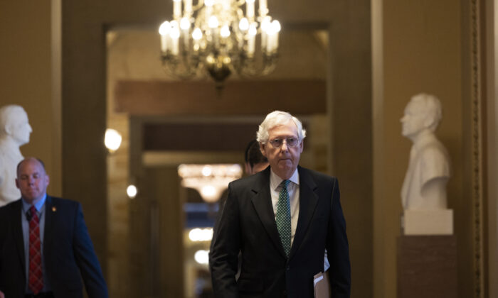 Senate Minority Leader Mitch McConnell (R-Ky.) walks to the Senate Chambers in the U.S. Capitol Building in the District of Columbia on May 11, 2022. (Anna Moneymaker/Getty Images)