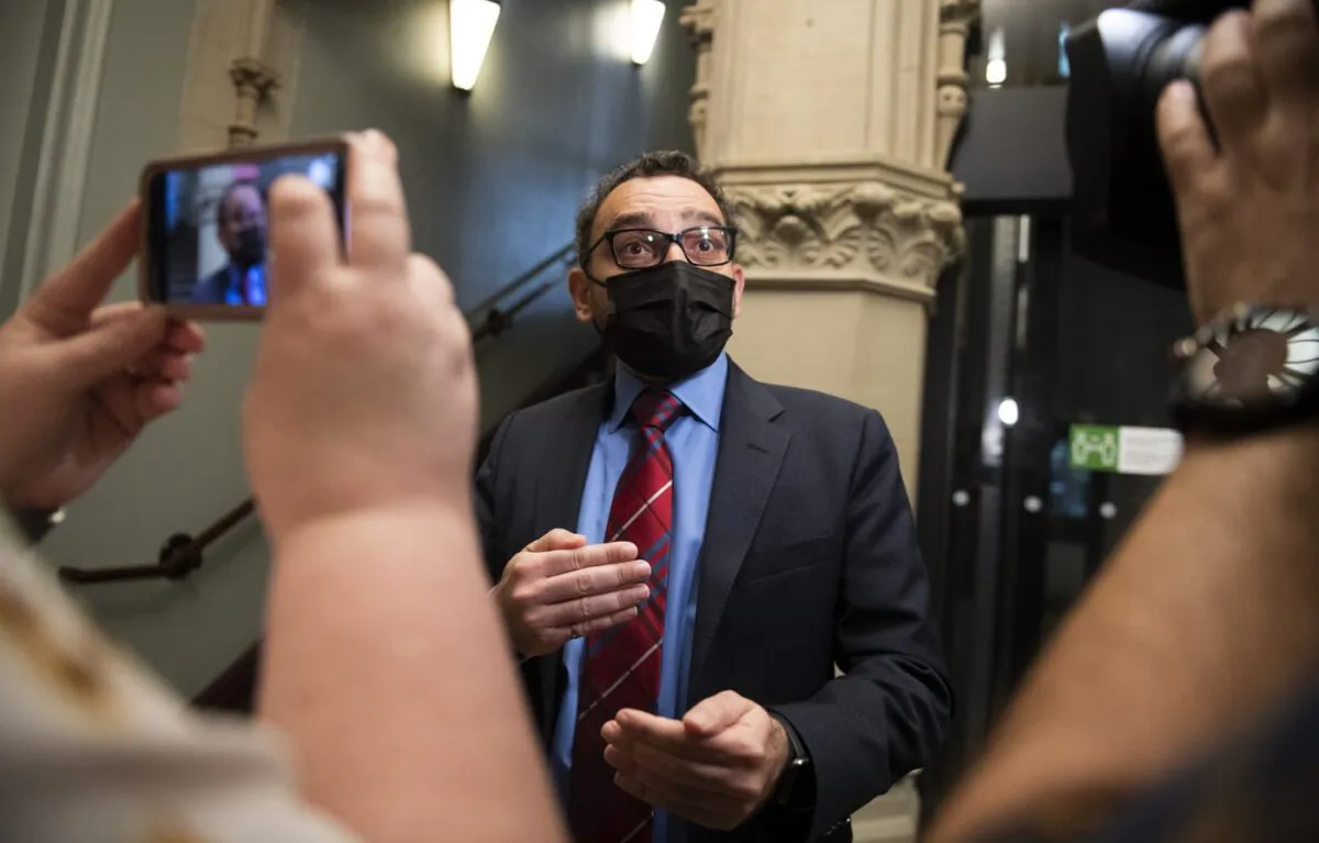 Minister of Transport Omar Alghabra speaks to reporters as he arrives for a caucus meeting on Parliament Hill in Ottawa, on May 11, 2022. (The Canadian Press/Justin Tang)