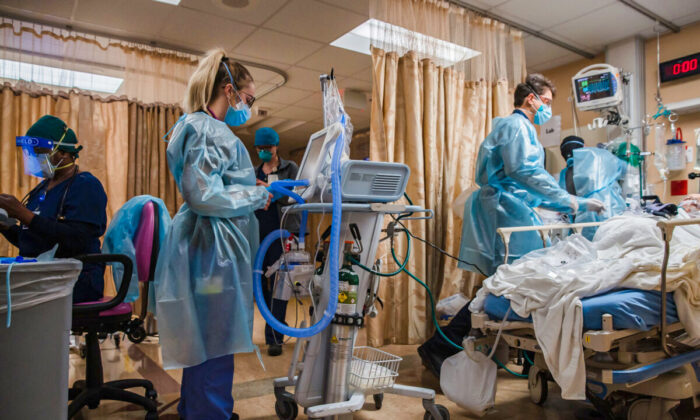 Health care workers are seen in a recent file photo. (Ariana Drehsler/AFP via Getty Images)