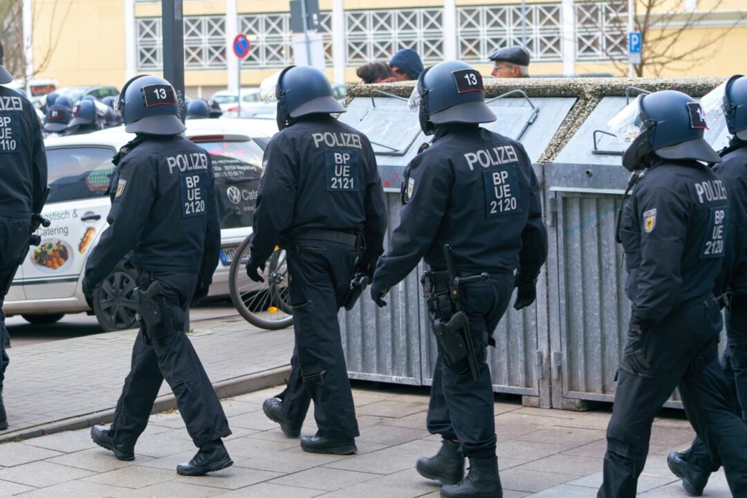 Police security forces are seen during protests by opponents of the Covid measures and compulsory vaccination in downtown Magdeburg, Germany, on Jan. 8, 2022. (Heiko Kueverling/Shutterstock)
