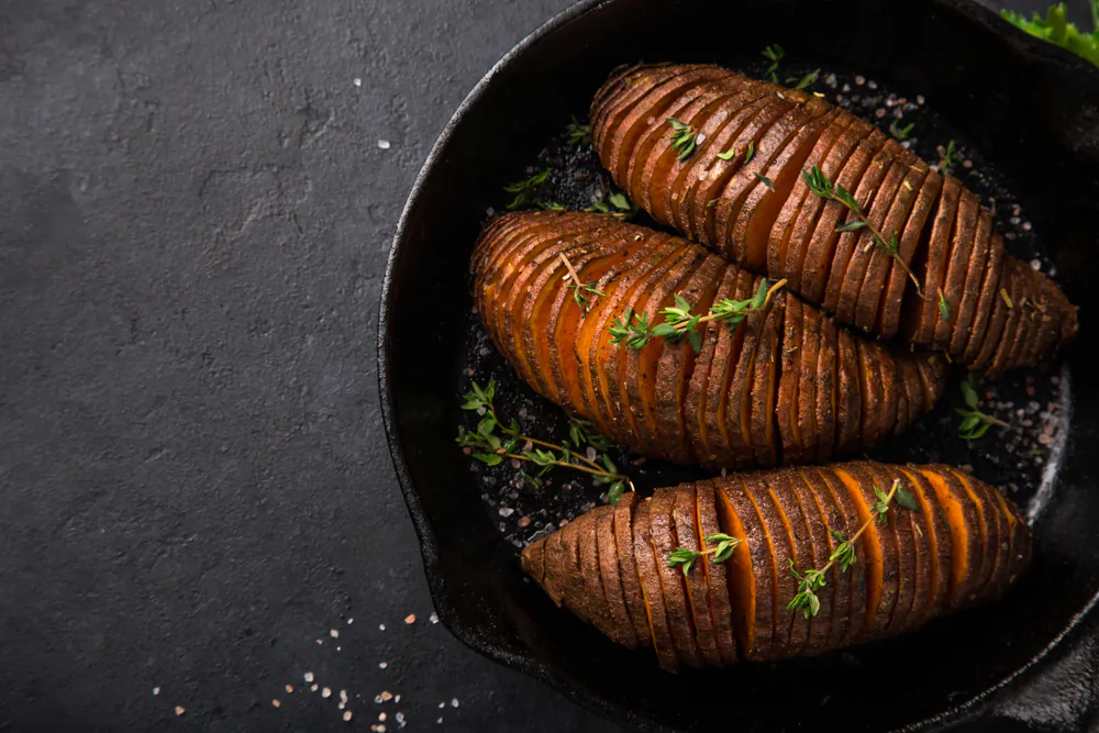 These accordion-like cuts amp up the flavor as much as the presentation: The spiced seasoning oil seeps between the crevices, and the fine edges crisp up beautifully.  (Anna Shepulova/Shutterstock)

