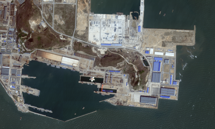 A People's Liberation Army Navy submarine sits in dry dock in Huludao Port in Liaoning province, China. Image captured by Planet Labs PBC, 3 May 2022.
