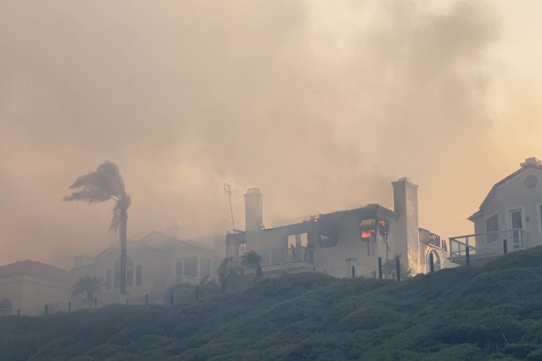 Fast-Moving Brush Fire Races Up OC Hillside, Burns Homes