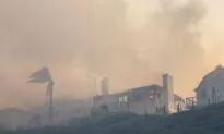 Fast-Moving Brush Fire Races Up OC Hillside, Burns Homes