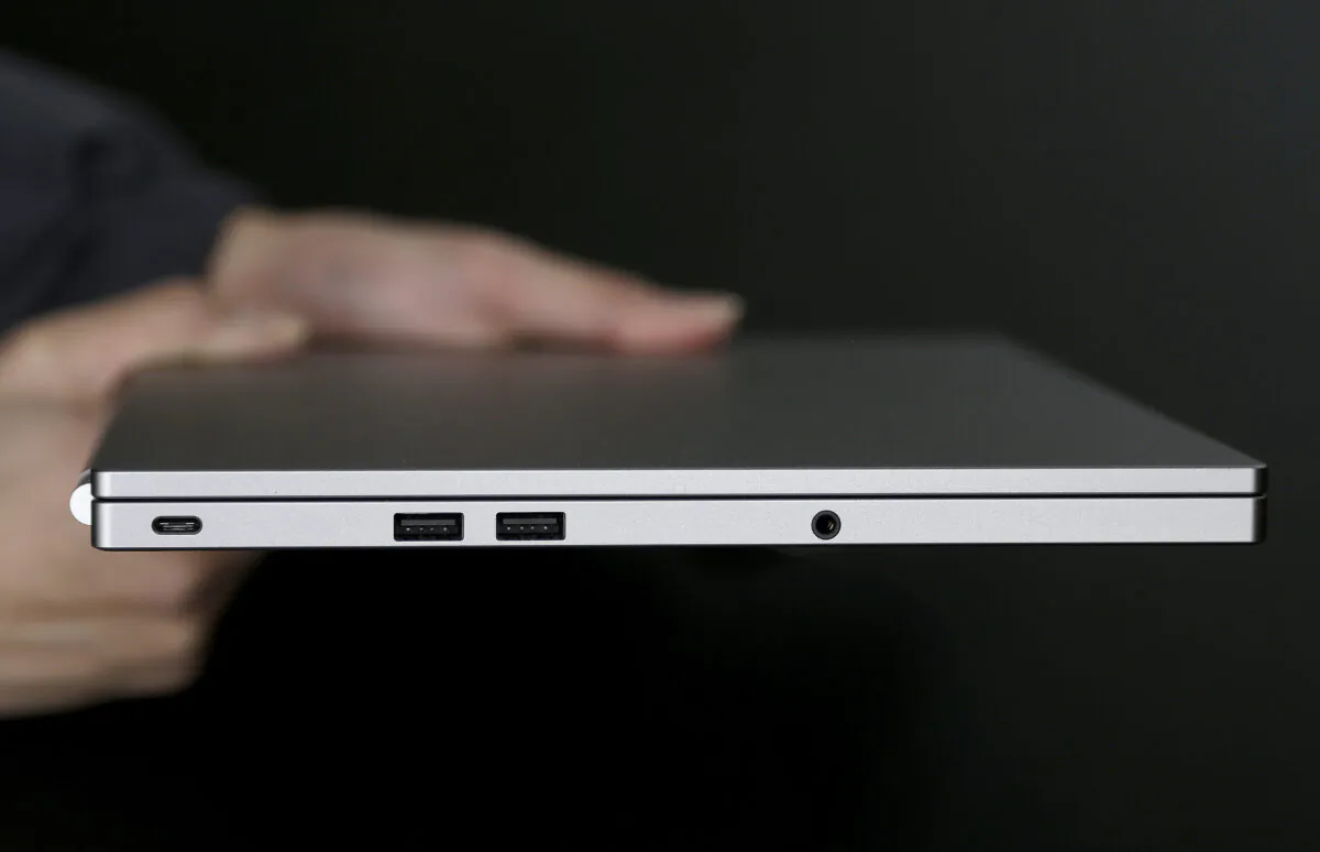 A photo shows, from left, the USB Type-C port, two standard USB ports, and headphone jack on a laptop, in San Jose, Calif., on March 10, 2015. (Jeff Chiu/AP Photo)