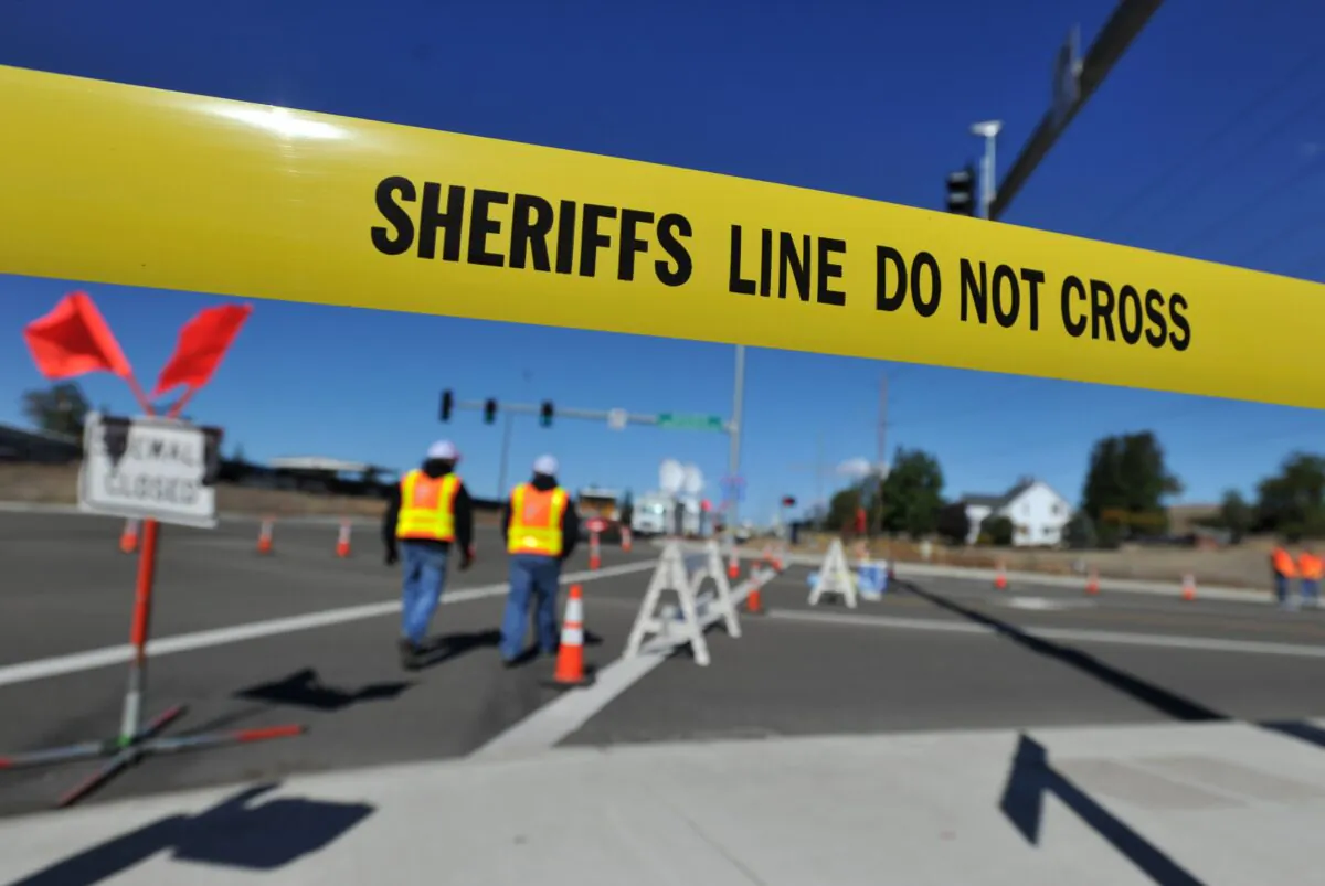 Police tape marks off the entrance to Umpqua Community College in Roseburg, Ore., on Oct. 3, 2015. (Josh Edelson/AFP via Getty Images)