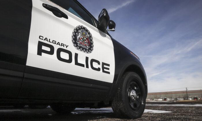 Police vehicles at Calgary Police Service headquarters on April 9, 2020. (The Canadian Press/Jeff McIntosh)