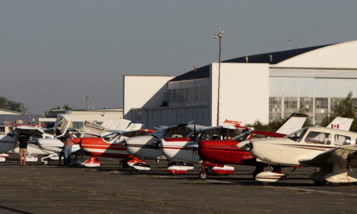 Small planes are parked side-by-side before taking off from Boundary Bay airport in Delta, B.C., on July 17, 2009. (The Canadian Press/Darryl Dyck)