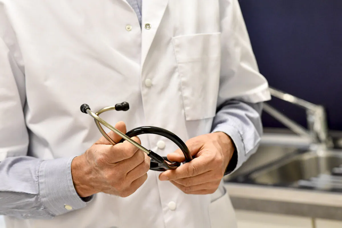 A doctor holds his stethoscope in this file photo. (Dirk Waem/Belga Mag/AFP via Getty Images)