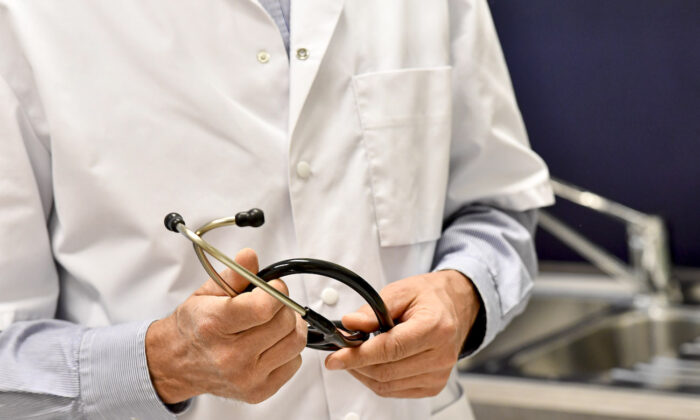 A doctor holding his stethoscope. (Dirk Waem/Belga Mag/AFP via Getty Images)