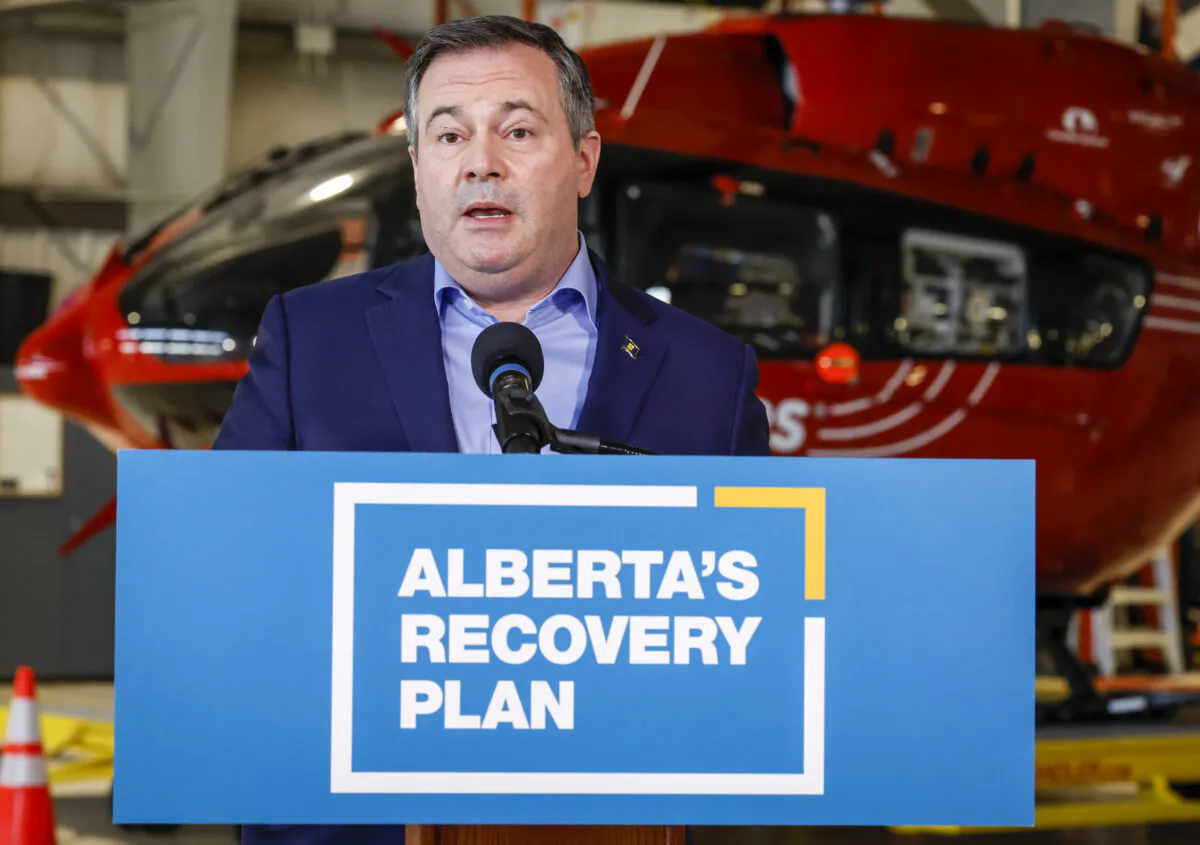 Alberta Premier Jason Kenney provides details on sustainable helicopter air ambulance funding in Calgary on March 25, 2022. (The Canadian Press/Jeff McIntosh)