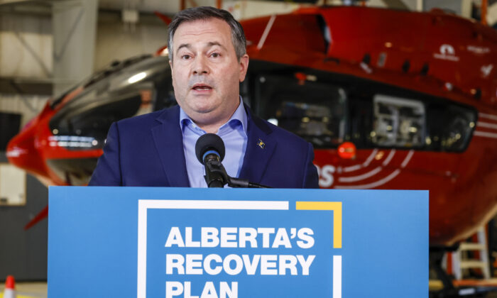 Alberta Premier Jason Kenney provides details on sustainable helicopter air ambulance funding in Calgary on March 25, 2022. (The Canadian Press/Jeff McIntosh)