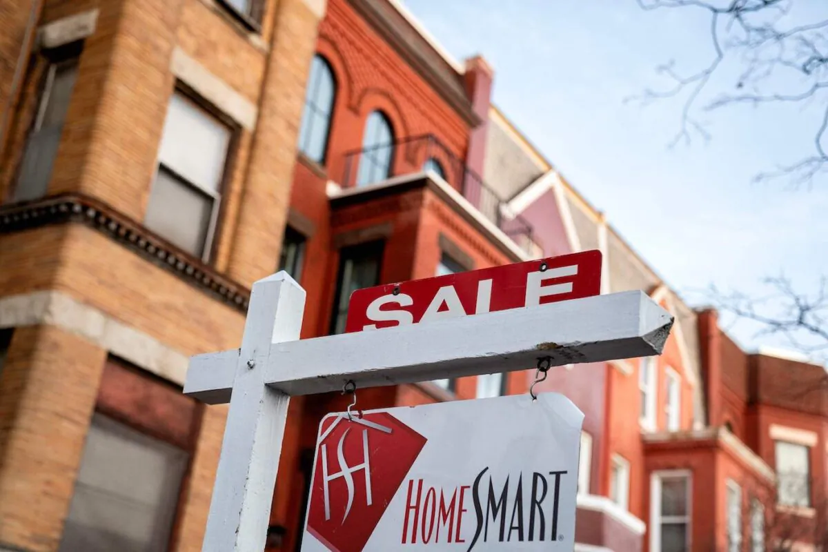 A for sale sign is displayed in front of a house in Washington on March 14, 2022. (Stefani Reynolds/AFP via Getty Images)