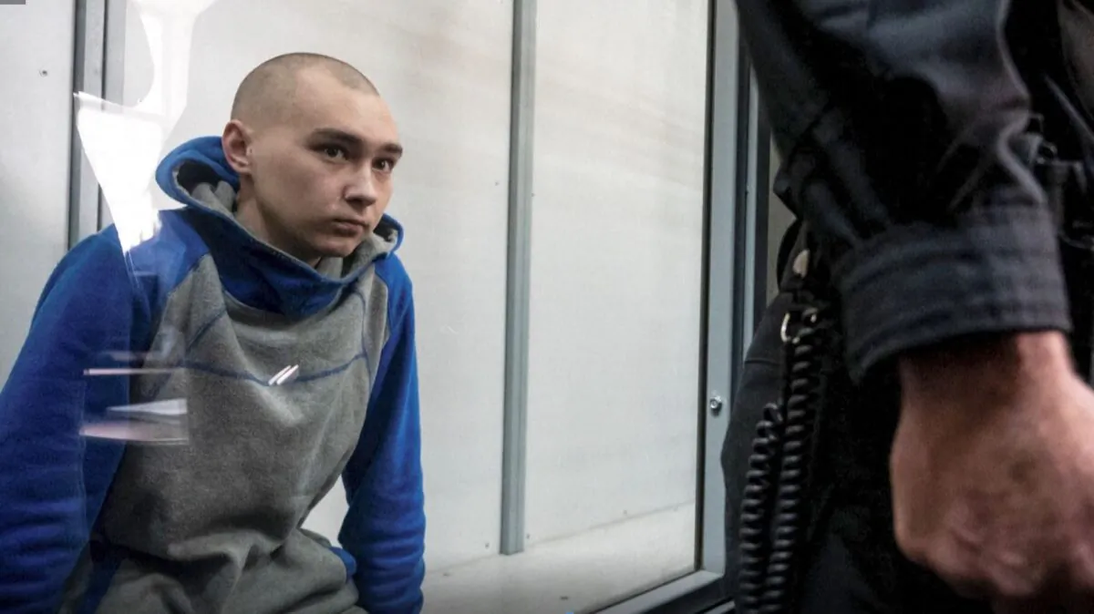 A video screenshot shows the captured Russian soldier, 21-year-old Vadim Shishimarin, who has been charged with the murder of a 62-year-old civilian in a northeastern Ukrainian village. (UNTV via Reuters/Screenshot via The Epoch Times)