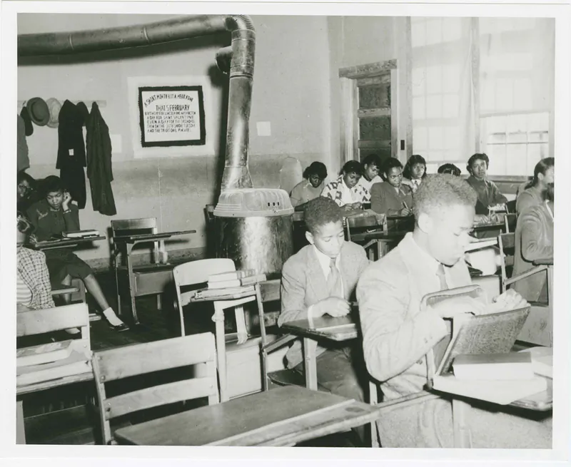 A 1951 photograph of Miss West's English 9 Class at R. R. Moton High School. It was used as Defendant's Exhibit No. 60, in the civil rights case Dorothy E. Davis et al. v. County School Board of Prince Edward County, Virginia, to show a comparison of conditions between black and white schools. This was one of five cases that were decided in Brown Vs. Board of Education.  (National Archives) 