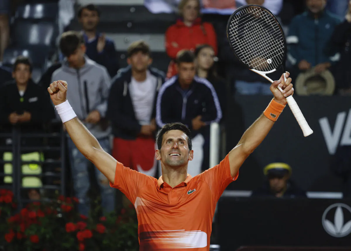 Serbia's Novak Djokovic celebrates winning his semifinal match against Norway's Casper Ruud at the Italian Open in Rome on May 14, 2022. (Guglielmo Mangiapane/Reuters)