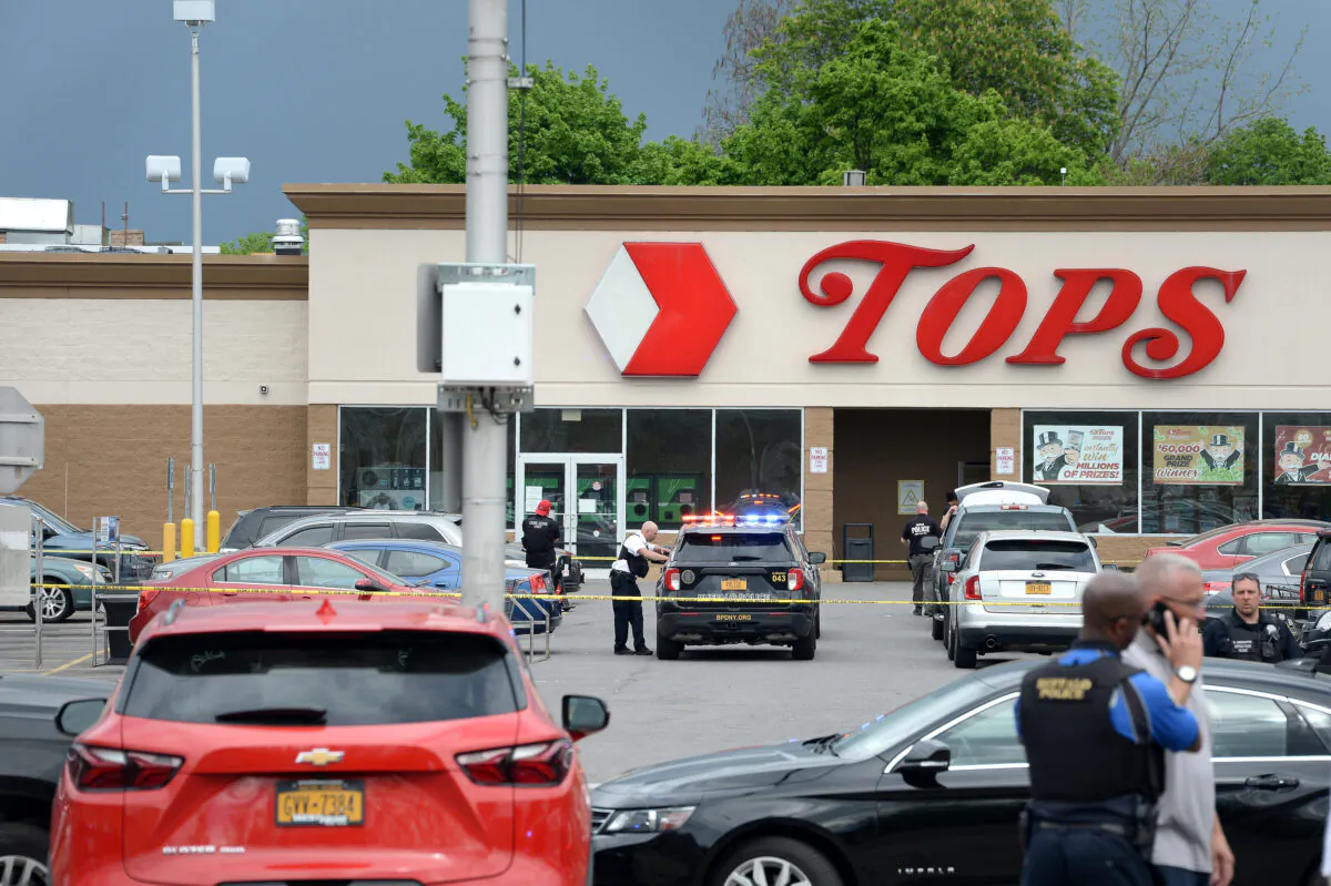 Police on scene at a Tops Friendly Market after a mass shooting at the store in Buffalo, N.Y., on May 14, 2022. (John Normile/Getty Images)