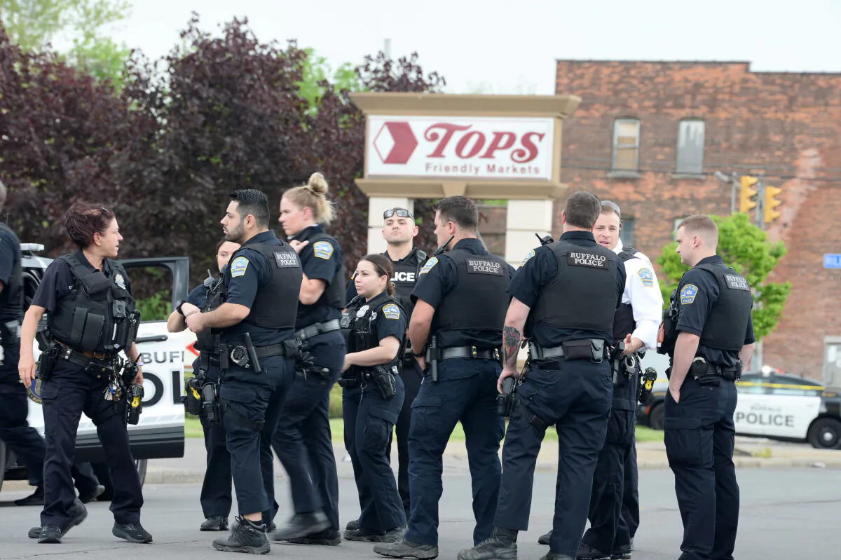 Police on scene at a Tops Friendly Market after a mass shooting at the store in Buffalo, N.Y., on May 14, 2022. (John Normile/Getty Images)