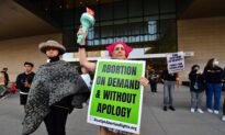 DOJ Group Calls for Staff to Have Paid Leave to Travel for Abortions