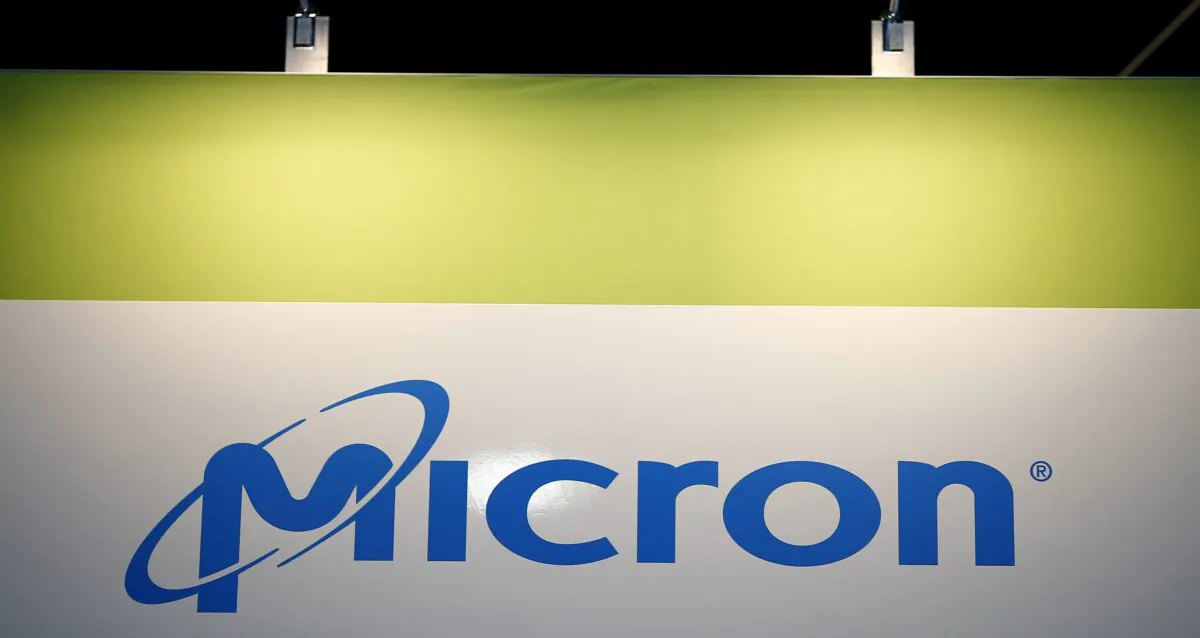 The logo of memory chip maker MicronTechnology at their booth at an industrial fair in Frankfurt, Germany, on July 14, 2015. (Kai Pfaffenbach/Reuters)