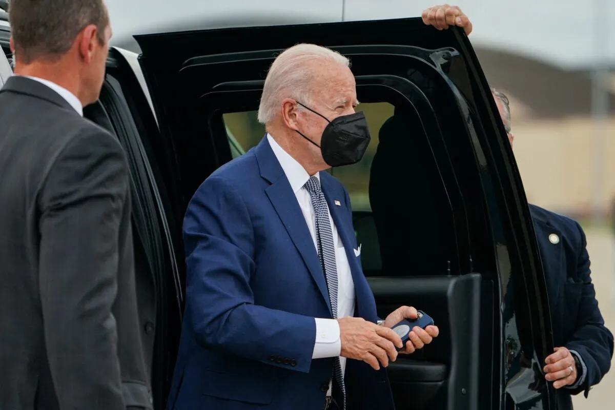 President Joe Biden boards Air Force One at Joint Base Andrews in Maryland, as he departs for a weekend in Wilmington, Del., on May 13, 2022. (Stefani Reynolds/AFP via Getty Images)