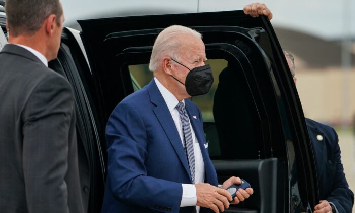 President Joe Biden boards Air Force One at Joint Base Andrews in Maryland, as he departs for a weekend in Wilmington, Del., on May 13, 2022. (Stefani Reynolds/AFP via Getty Images)