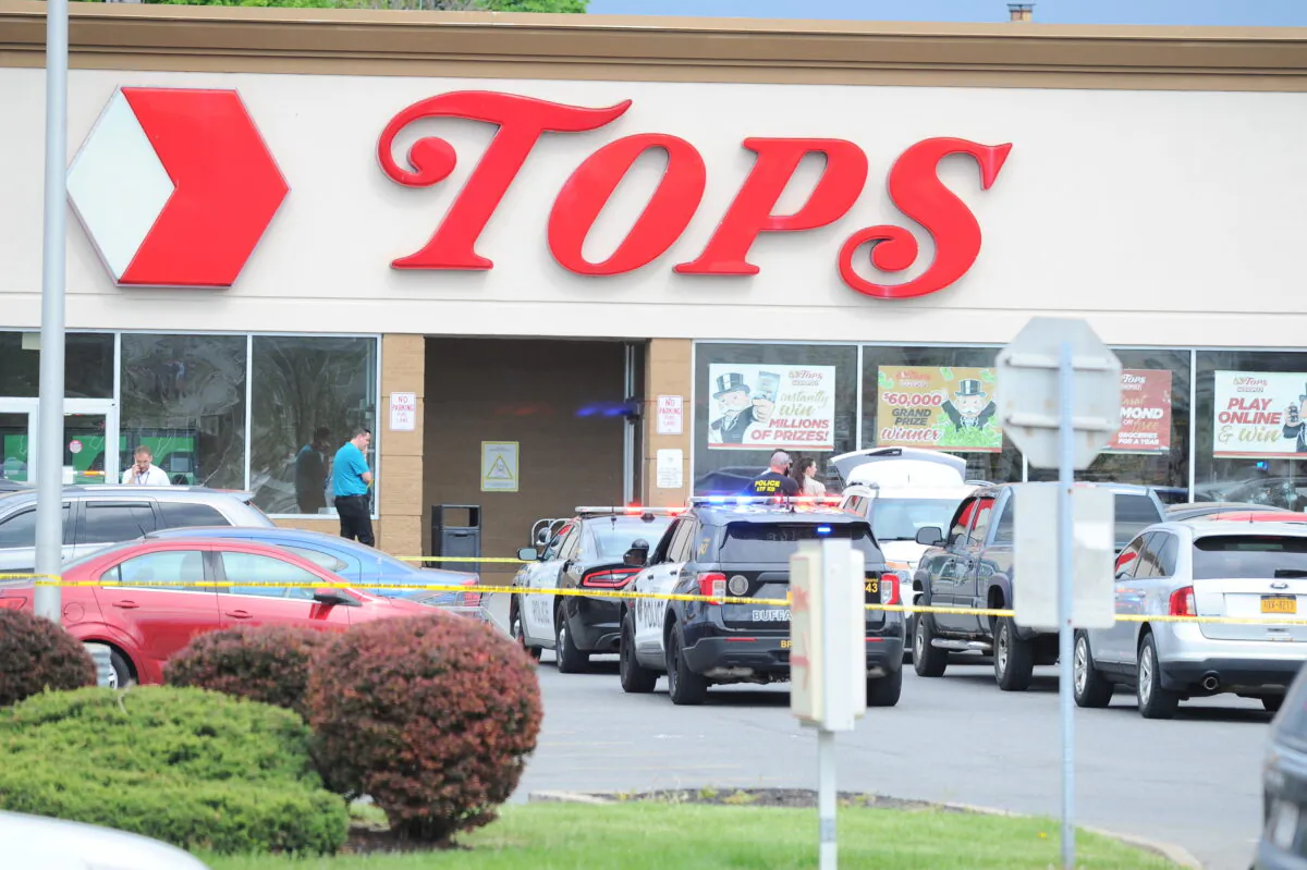 Police on scene at a Tops Friendly Market after a mass shooting at the store in Buffalo, N.Y., on May 14, 2022. (John Normile/Getty Images)