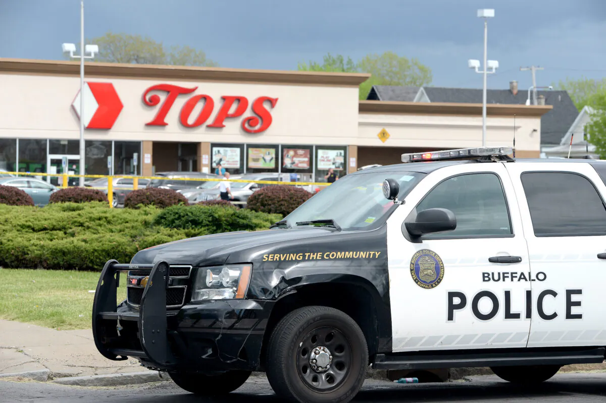 Police on scene at a Tops Friendly Market after a mass shooting at the store in Buffalo, N.Y., on May 14, 2022. (John Normile/Getty Images)