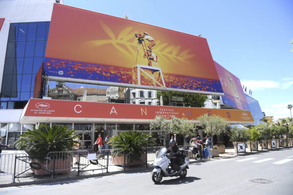 A scooter drives past the Palais des festivals appears during the 72nd international film festival, Cannes