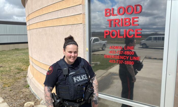Const. Jennaye Norris of the Blood Tribe Police poses in Standoff, Alta., on May 9, 2022. (The Canadian Press/Bill Graveland)