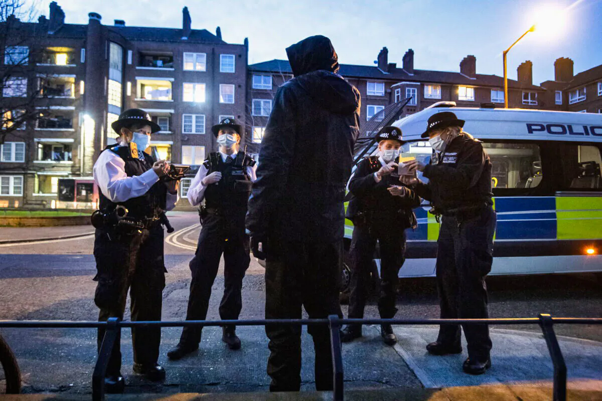 Police in London in an undated file photo. The Home Office is permanently easing restrictions on the use of police stop-and-search tactics. (Victoria Jones/PA)