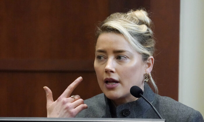 Actress Amber Heard testifies in the courtroom at the Fairfax County Circuit Courthouse in Fairfax, Va., on May 16, 2022. (Steve Helber/Pool via AP Photo)