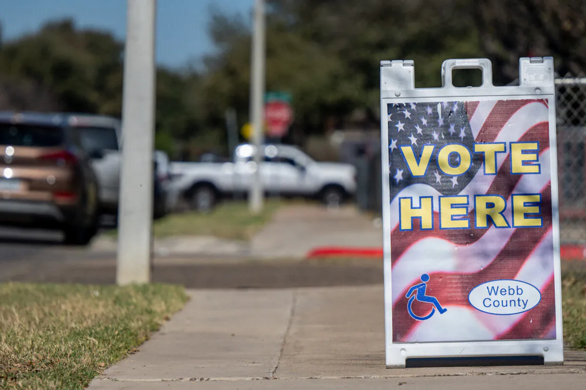 A 'Vote Here' sign is displayed near a polling station in Laredo, Texas, on March 1, 2022. (Brandon Bell/Getty Images)