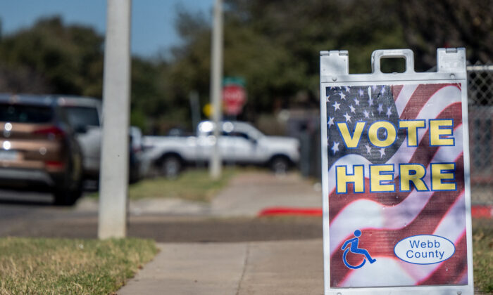 A 'Vote Here' sign is displayed near a polling station in Laredo, Texas, on March 1, 2022. (Brandon Bell/Getty Images)
