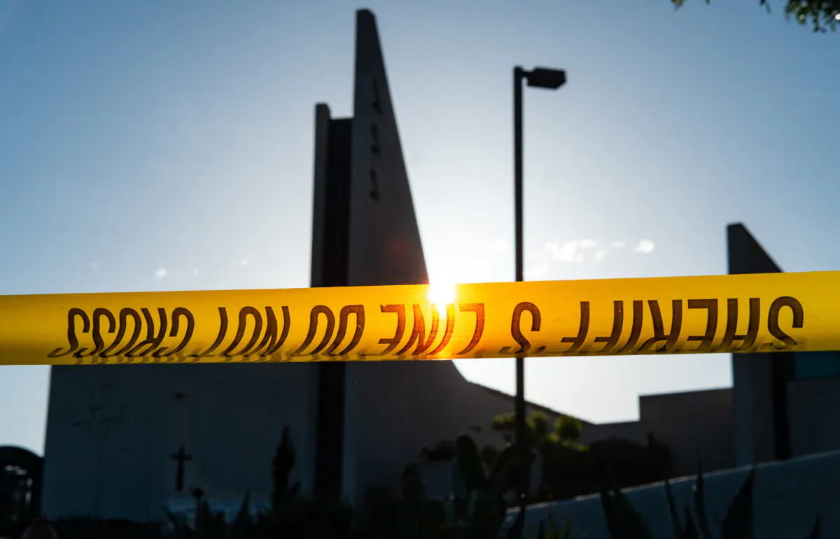 Law enforcement officials respond to a shooting at Geneva Presbyterian Church in Laguna Woods, Calif., on May 15, 2022. (John Fredricks/The Epoch Times)