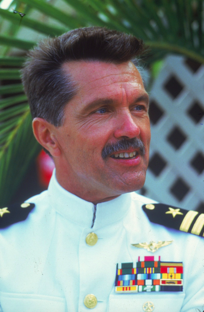 man in Navy whites uniform in TOP GUN