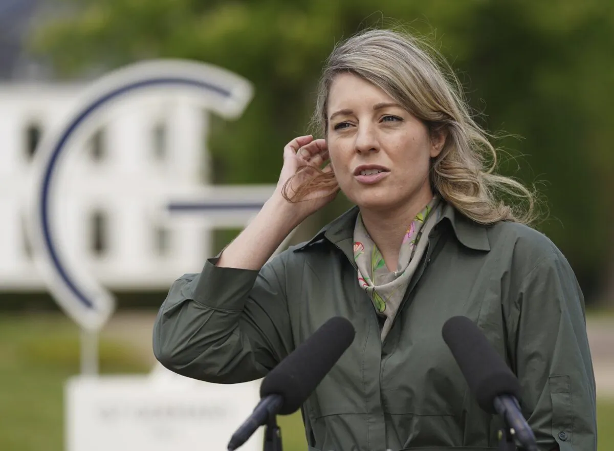 Melanie Joly, Foreign Minister of Canada, addresses the media during a statement as part of the meeting of foreign ministers of the G7 Group of leading democratic economic powers at the Weissenhaus resort in Weissenhaeuser Strand, Germany, May 14, 2022. (The Canadian Press/Pool via AP)