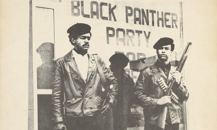Black and white poster of Huey Newton (R) and Bobby Seale in front of the storefront headquarters of the Black Panther Party in Oakland, Calif. (Public Domain)