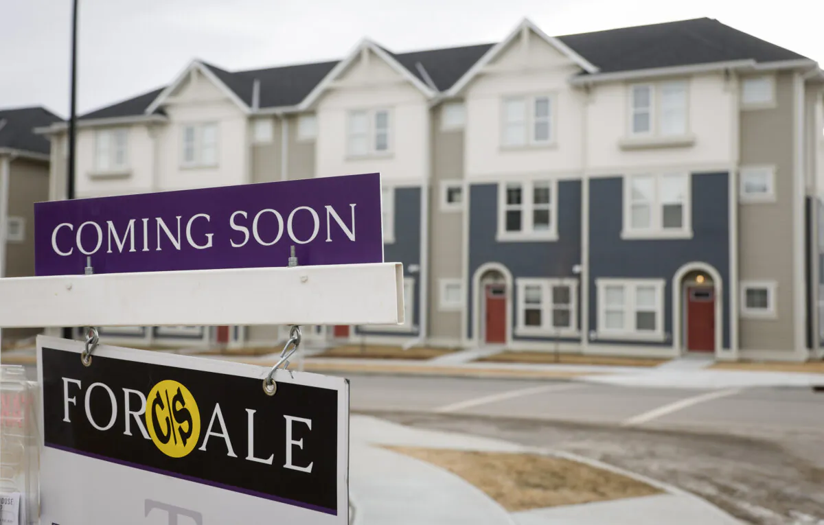 Houses for sale in a new subdivision in Airdrie, Alberta, on Jan. 28, 2022. (Jeff McIntosh/The Canadian Press)