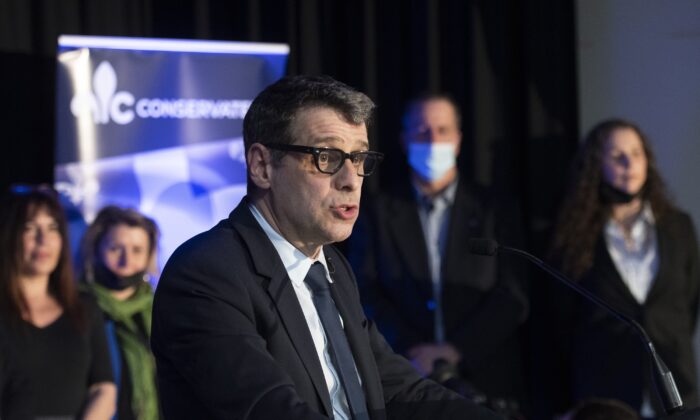 Quebec Conservative Leader Eric Duhaime speaks to supporters at a rally where he announced he will run in the Chauveau riding in the next provincial election in October, in Quebec City on April 5, 2022. (Jacques Boissinot/The Canadian Press)