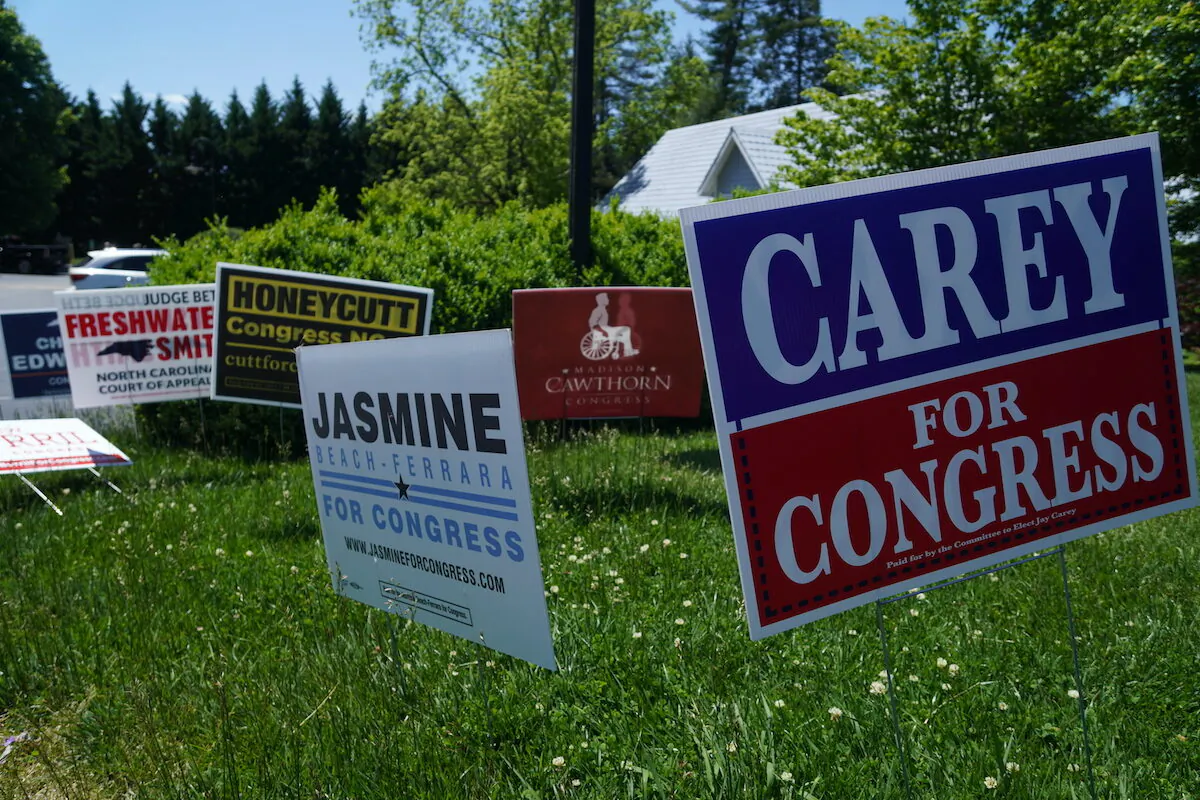 Election signs outside Flat Rock Village Office's polling center in Flat Rock, North Carolina on May 17, 2022 (Jackson Elliott/The Epoch Times)