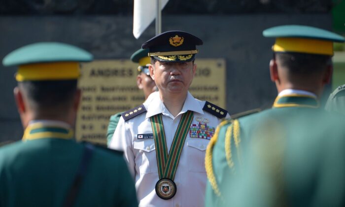General Koji Yamazaki (C), chief of staff of Japan's Ground Self-Defense Force, attends a welcoming ceremony at the Philippine army headquarters in Manila on March 4, 2019. (Ted Aljibe/AFP via Getty Images)