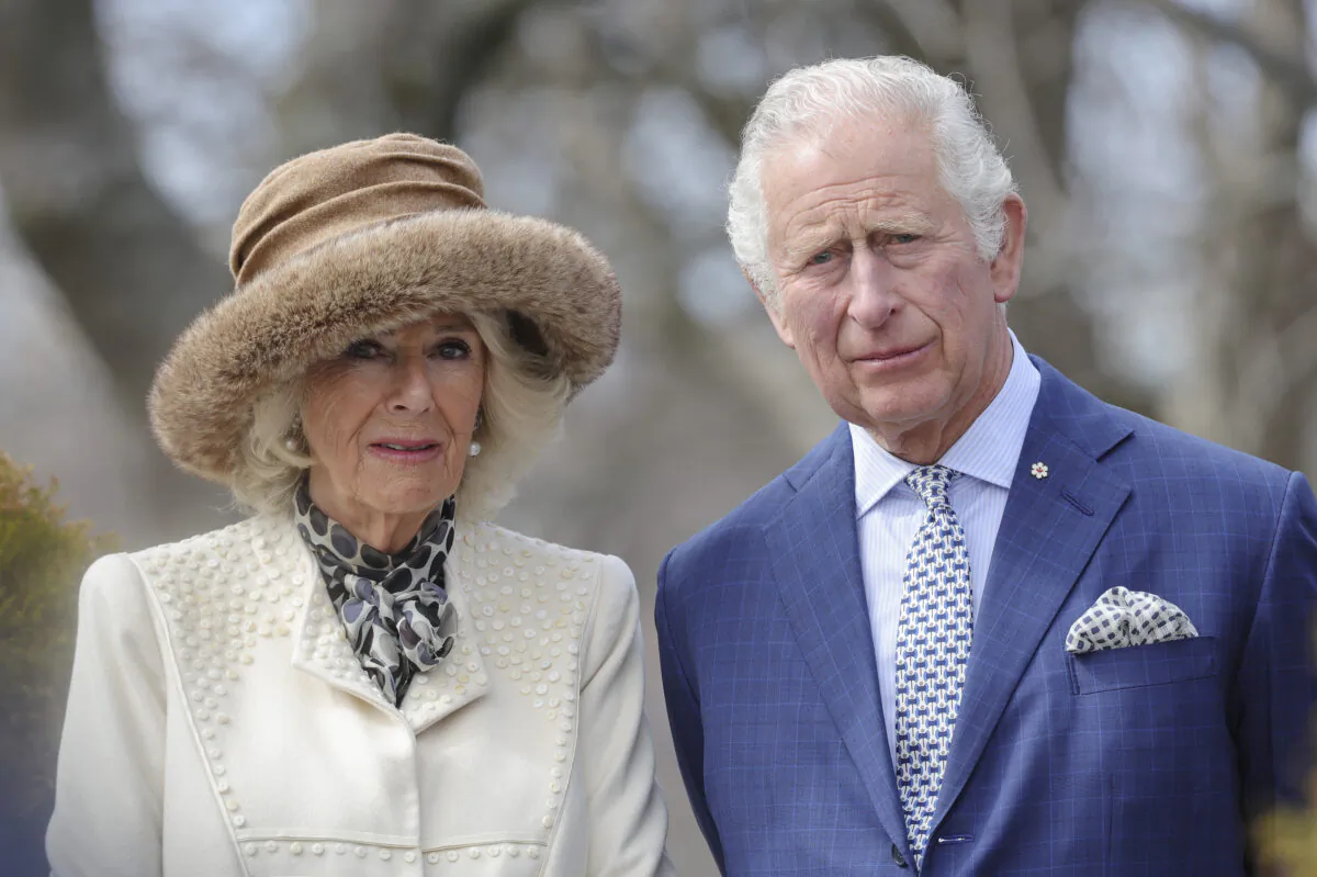 Prince Charles, Prince of Wales, and Camilla, Duchess of Cornwall, observe a moment of silence to honour and remember the indigenous children who attended residential schools in Labrador and Northern Newfoundland as part of a solemn ceremony in the Heart Garden during day one of the Platinum Jubilee Royal Tour of Canada in Saint John's, Canada, on May 17, 2022. (Chris Jackson/Getty Images)