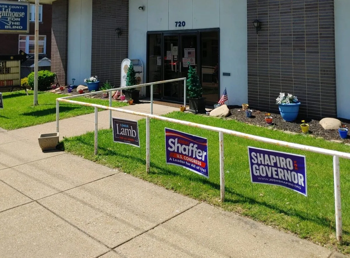 Lawn signs in New Brighton, Pennsylvania, on May 17, 2022. (Jeff Louderback/The Epoch Times)