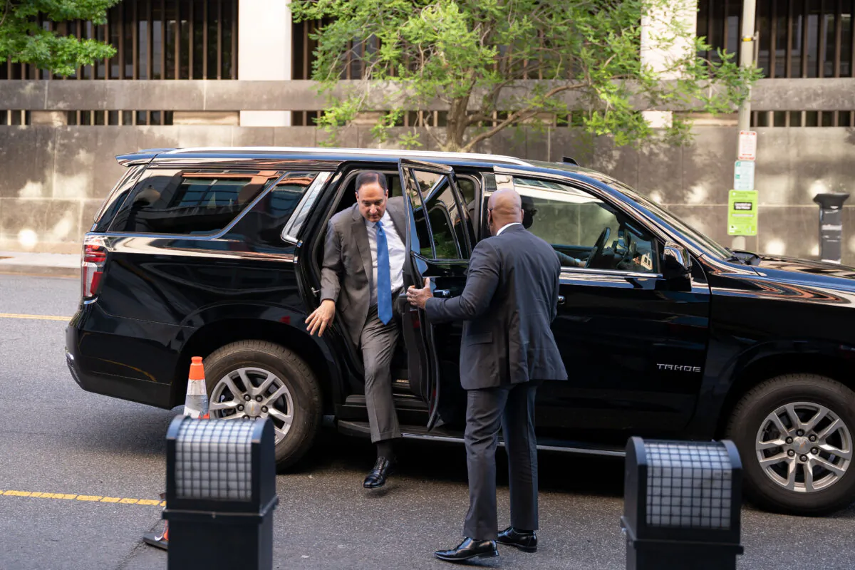 Michael Sussmann arrives at federal court in Washington on May 18, 2022. (Teng Chen for The Epoch Times)