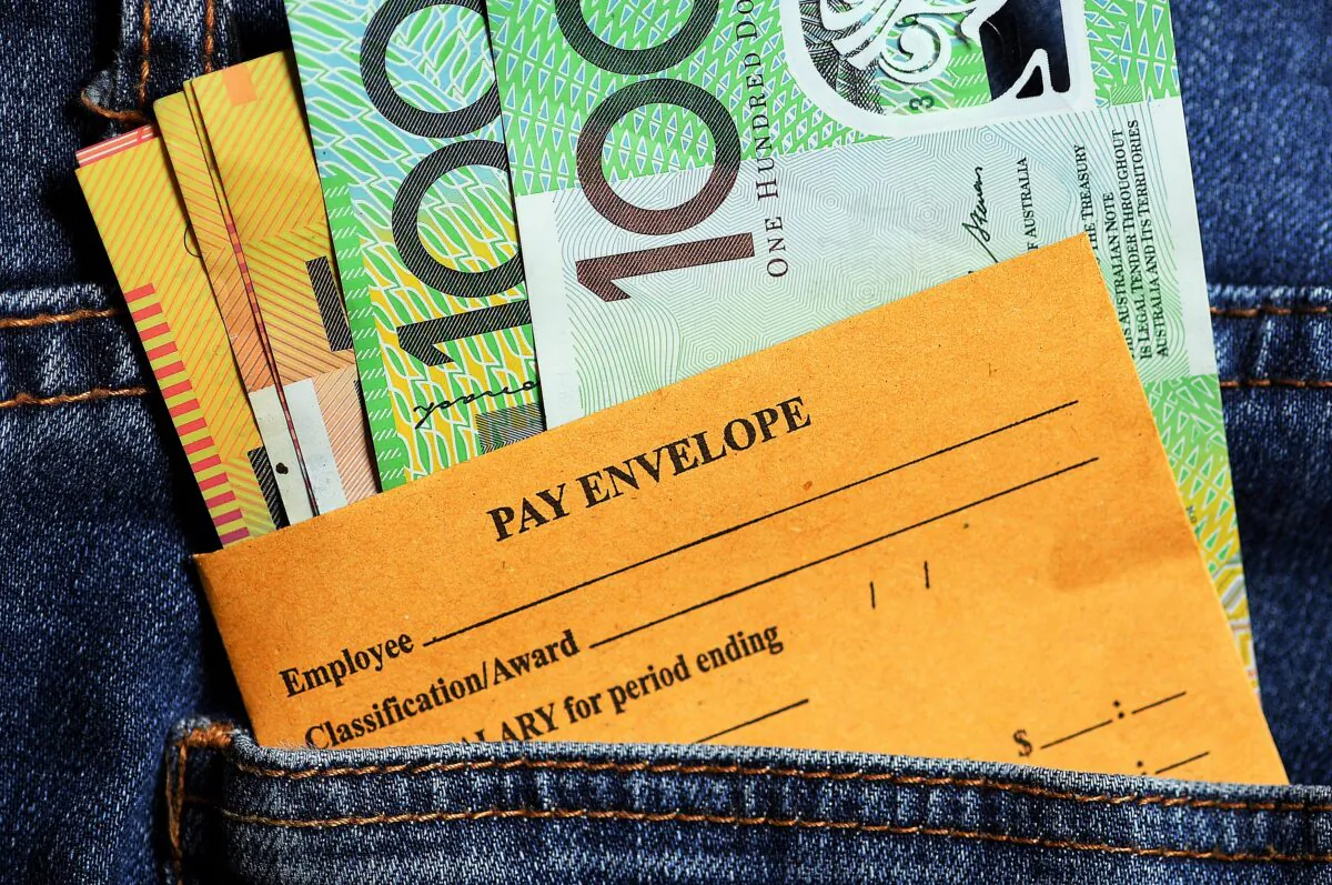 Australian currency and a wages envelope on the Gold Coast, Australia, on Feb. 22, 2018. (AAP Image/Dave Hunt)