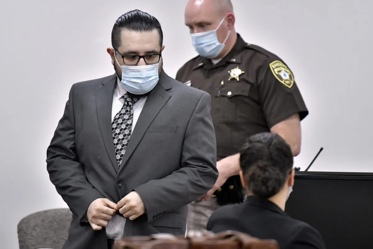 Armando Barron arrives in a courtroom on the first day of his trial at Cheshire County Superior Court in Keene, N.H., on May 17, 2022. (Josh Reynolds/AP Photo)