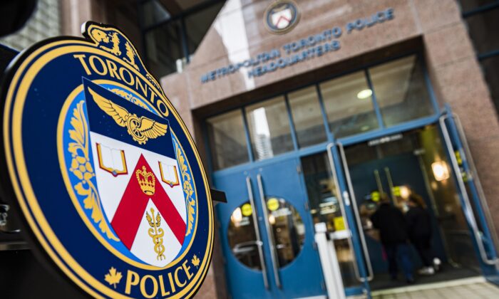 The Toronto Police Services emblem is photographed during a press conference at TPS headquarters, in Toronto on May 17, 2022. (The Canadian Press/Christopher Katsarov)